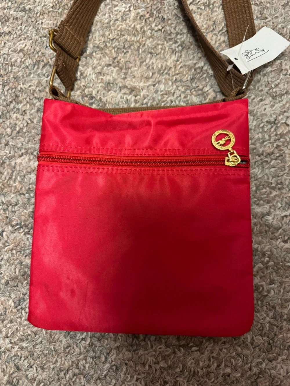 Longchamp Red Crossbody Bag with Brown Strap and Gold Accents